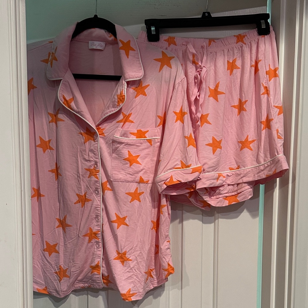 Pink Lily small pajama set.  Pink and orange star design.  Like new